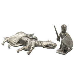 Knight kneeling near his died horse